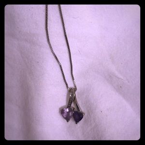 Silver necklace with purple stones